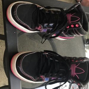 1# women’s black and pink adidas high tops